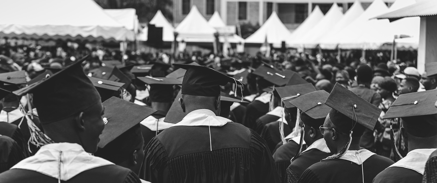 Graduates in caps and gowns gathered at a convocation ceremony